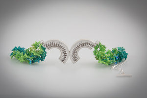 Double twist Sterling Silver on Green Murano Glass